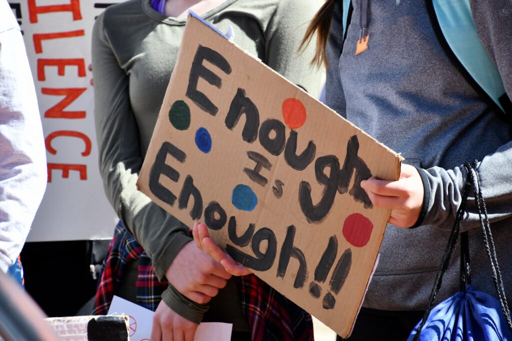 Enough is Enough hand painted protest sign, racial violence Stop Asian Hate BLM LGBTQ